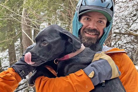 dog rescued from falling off cliff